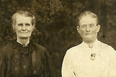 Detail showing two women on the right, one of whom may be Rebecca Reaves